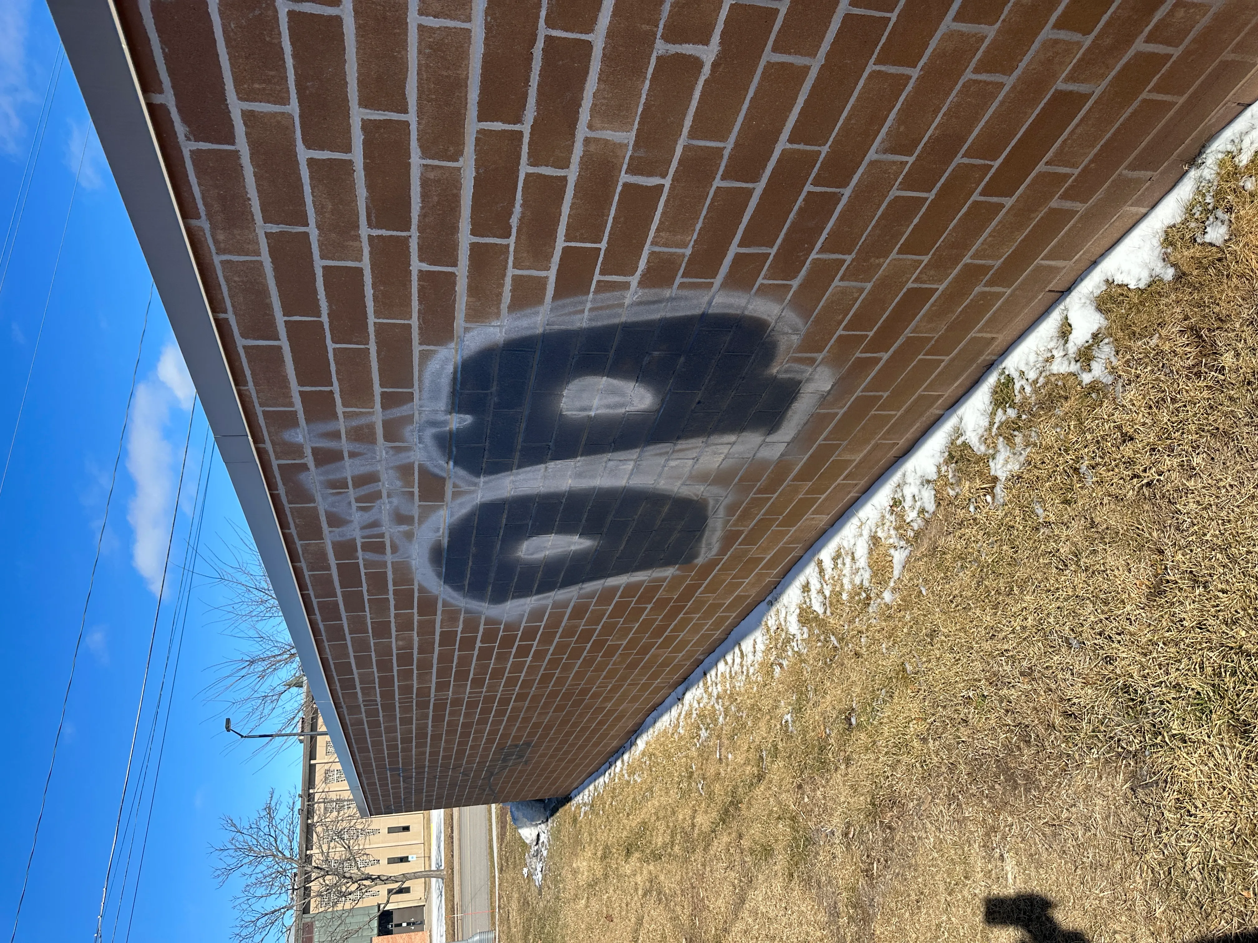 Commercial graffiti removal on brick