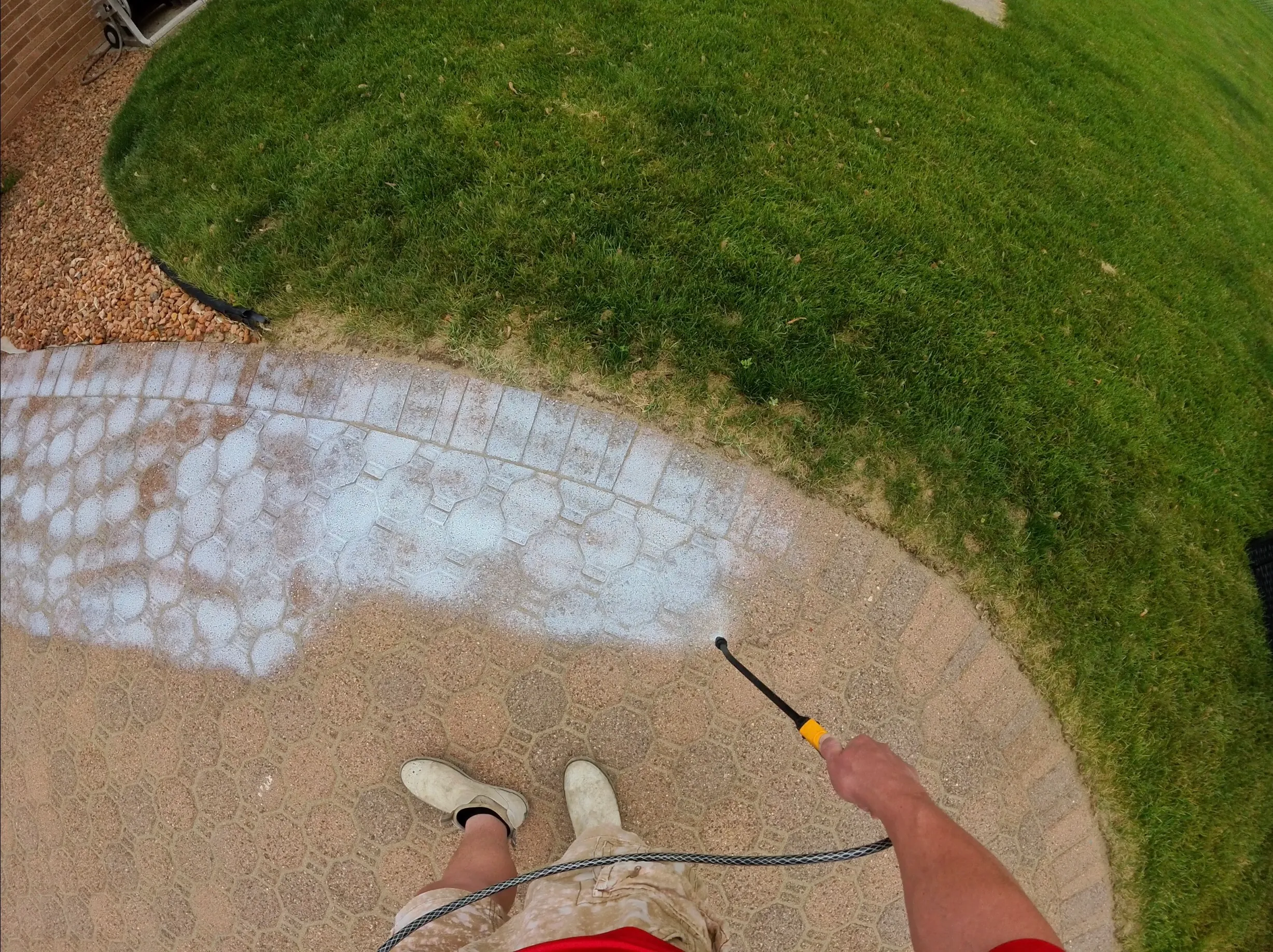 Applying protective sealant to brick pavers